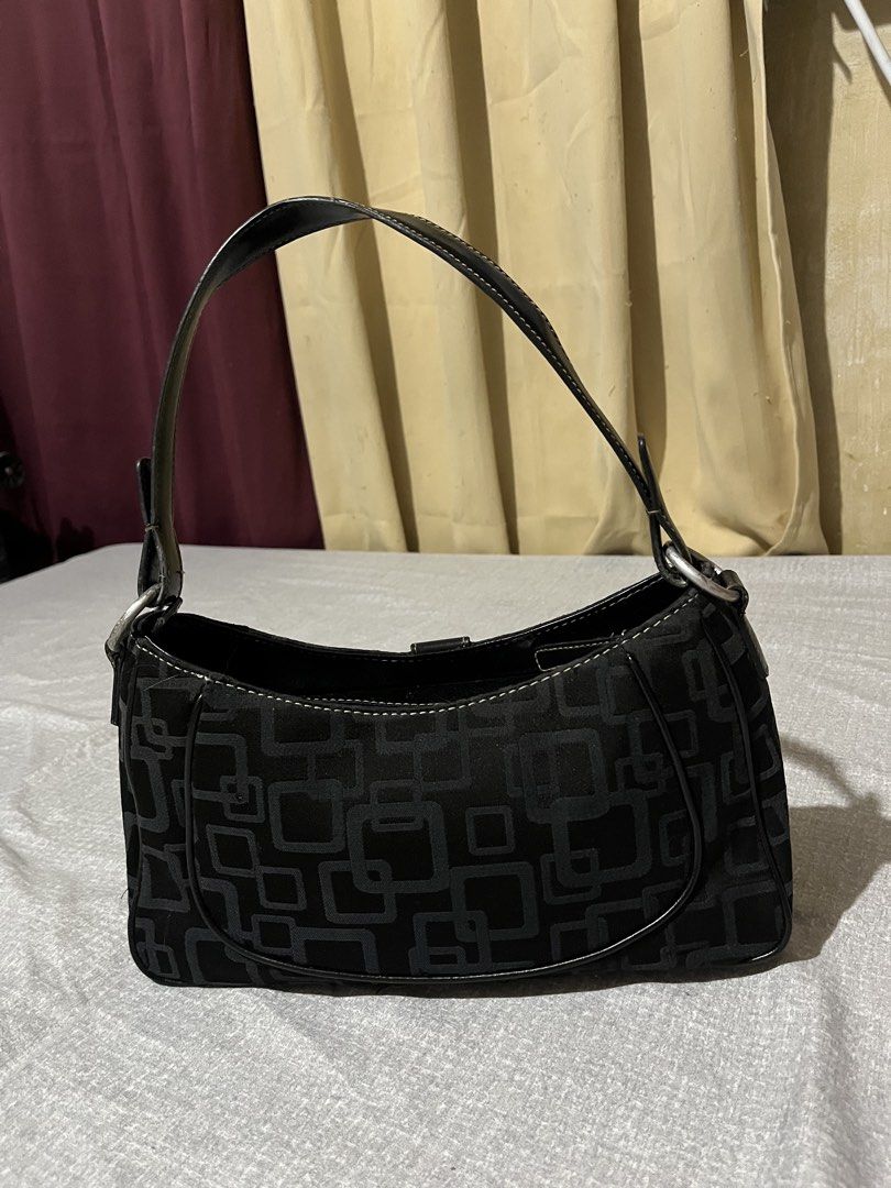 Black Shoulder Bag with Geometric Pattern (Category: Shoulder Bags) located in Manila. Submitted by az0r_ (Listing ID 1462410052, Image 3). Description: - Stylish black shoulder bag - Unique all-over geometric pattern - Front buckle detail - Genuine leather strap and trim - Silver hardware - Ideal for daily use - Fits your essentials.