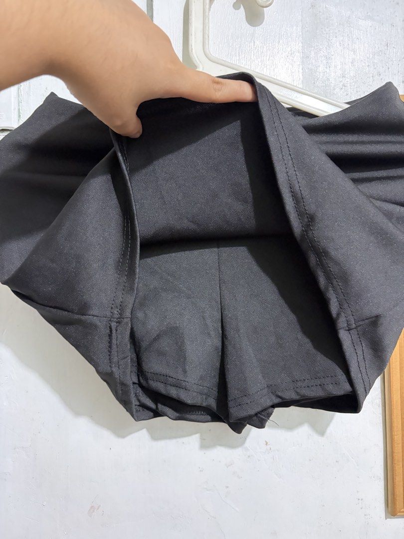 Black Skirt with Shorts (Category: Skirts) located in Quezon City. Submitted by berrystrawng (Listing ID 1462370057, Image 2). Description: never used size: small to large (stretchable) rfs: too short.