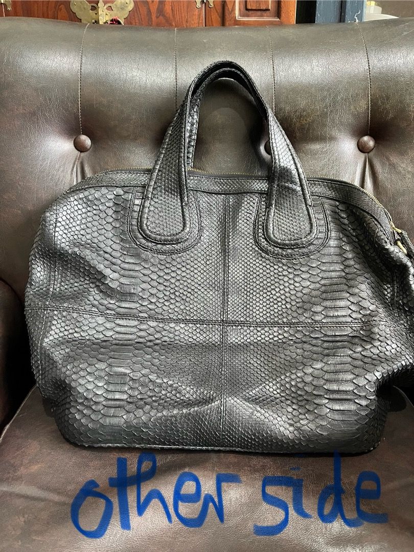 Black Snakeskin Leather Handbag (Category: Purses & Pouches) located in Makati City. Submitted by Ina_Ndang (Listing ID 1462294622, Image 3). Description: - very chic handbag; can be used as laptop or document bag - color is black - genuine snakeskin leather - main bag is zippered; with long strap slot but no strap included - 1 open interior pocket, 1 zippered compartment - navy blue color lining - NO FLAWS but preloved Approximate dimension: 13.