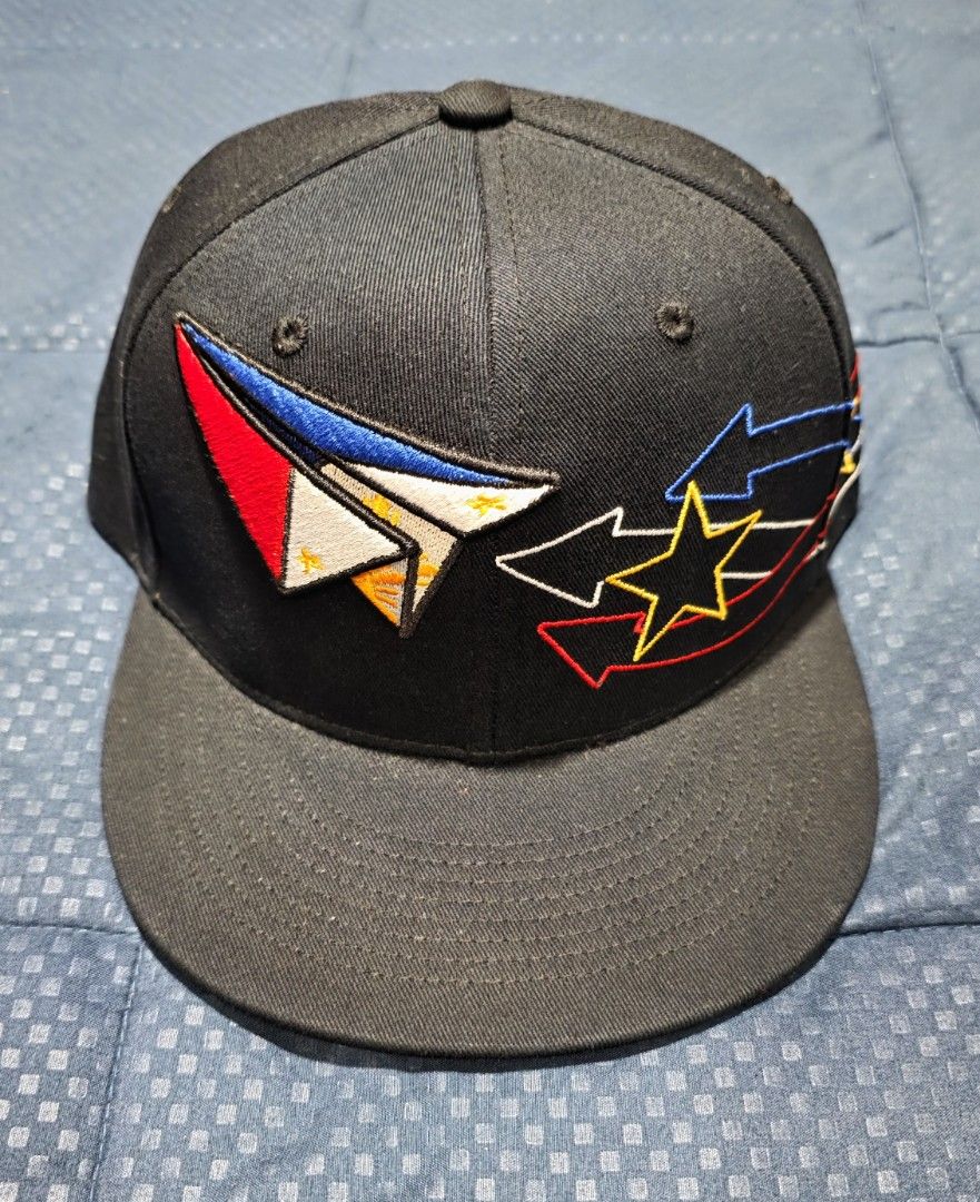 Black Snapback Cap with Philippine Flag Paper Plane Design (Category: Caps & Hats) located in Santa Rosa. Submitted by rowhell09 (Listing ID 1462318589, Image 1). Description: Philppine cap brandnew 1000 MOD. LBC MOP. BDO, GCASH LOC. NUEVA ECIJA - Black snapback cap - Embroidered design on front: Paper plane inspired by Philippine flag - Accents on the side: Stars and lightning bolt - Small skull embroidery on the back - Flat brim with blue under