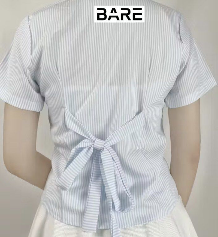 Black Stripes Polo Shirt (Category: Blouses) located in Manila. Submitted by nicsiey (Listing ID 1462299514, Image 2). Description: Women’s Shirt With Bow Embroidered Vneck 4 times lang nagamit. Color: Black Stripes Size: Small Bust - 18.5” Length - 21”.