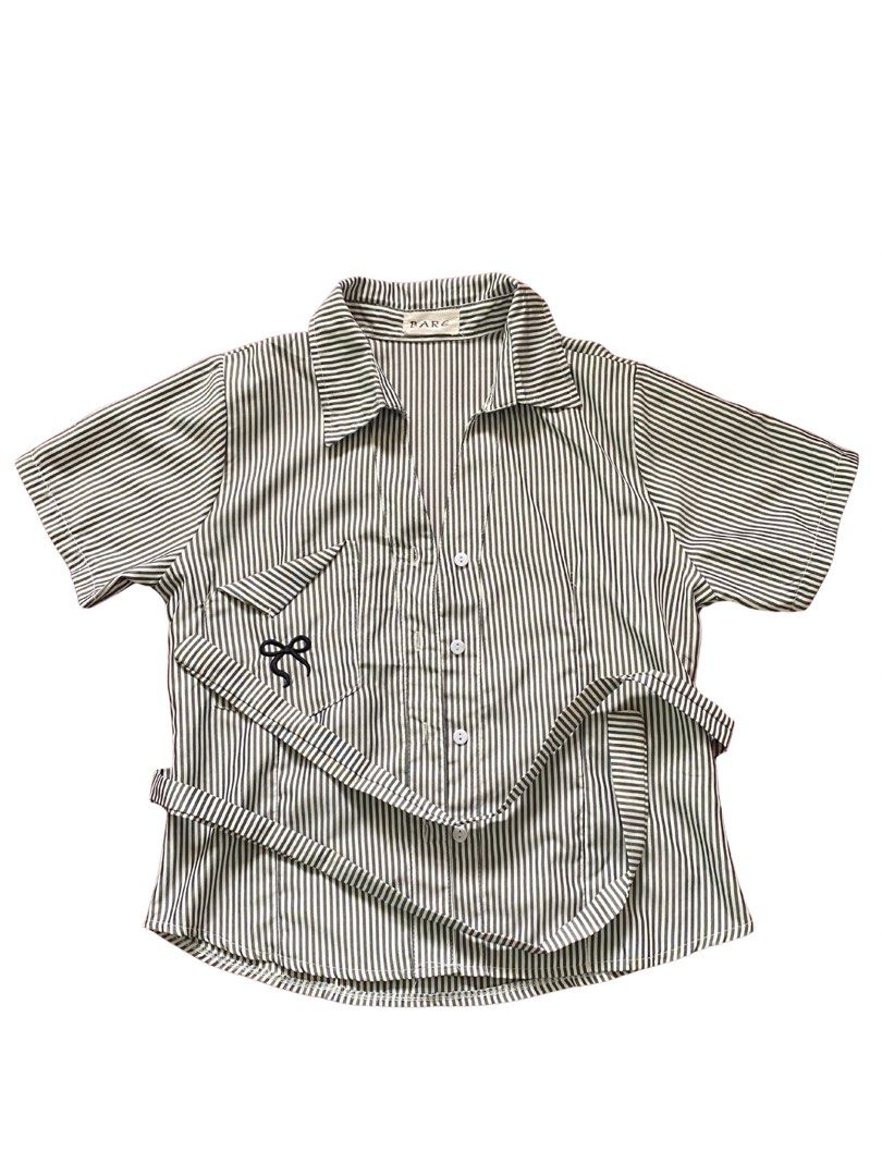 Black Stripes Polo Shirt (Category: Blouses) located in Manila. Submitted by nicsiey (Listing ID 1462299514, Image 3). Description: Women’s Shirt With Bow Embroidered Vneck 4 times lang nagamit. Color: Black Stripes Size: Small Bust - 18.5” Length - 21”.