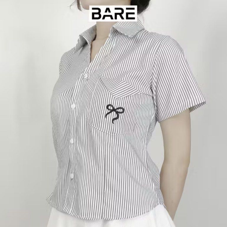 Black Stripes Polo Shirt (Category: Blouses) located in Manila. Submitted by nicsiey (Listing ID 1462299514, Image 1). Description: Women’s Shirt With Bow Embroidered Vneck 4 times lang nagamit. Color: Black Stripes Size: Small Bust - 18.5” Length - 21”.