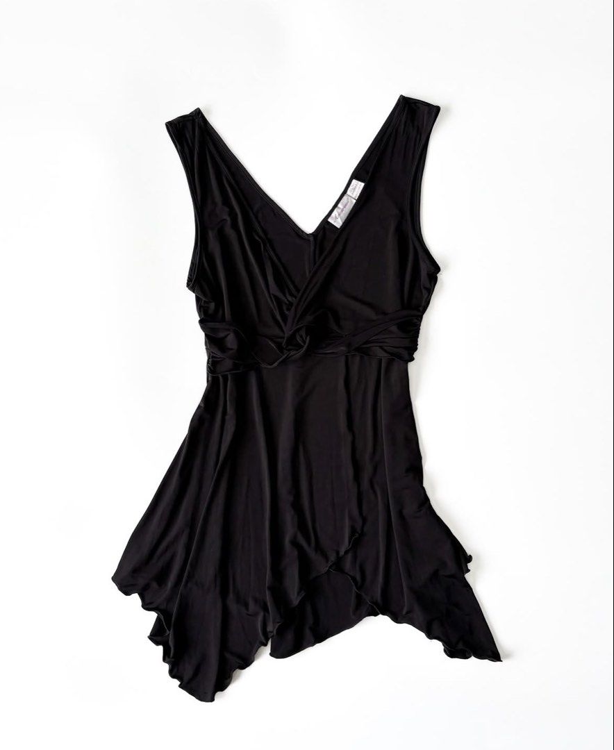 Black Vintage Asymmetrical Long Top (Category: Blouses) located in Paranaque City. Submitted by jo_sells_things (Listing ID 1462411359, Image 1). Description: - Sleeveless black dress - Flowing asymmetrical hemline - Fits M - L - Bought second hand, never worn since - RFS: Closet clean out Dm for more photos .