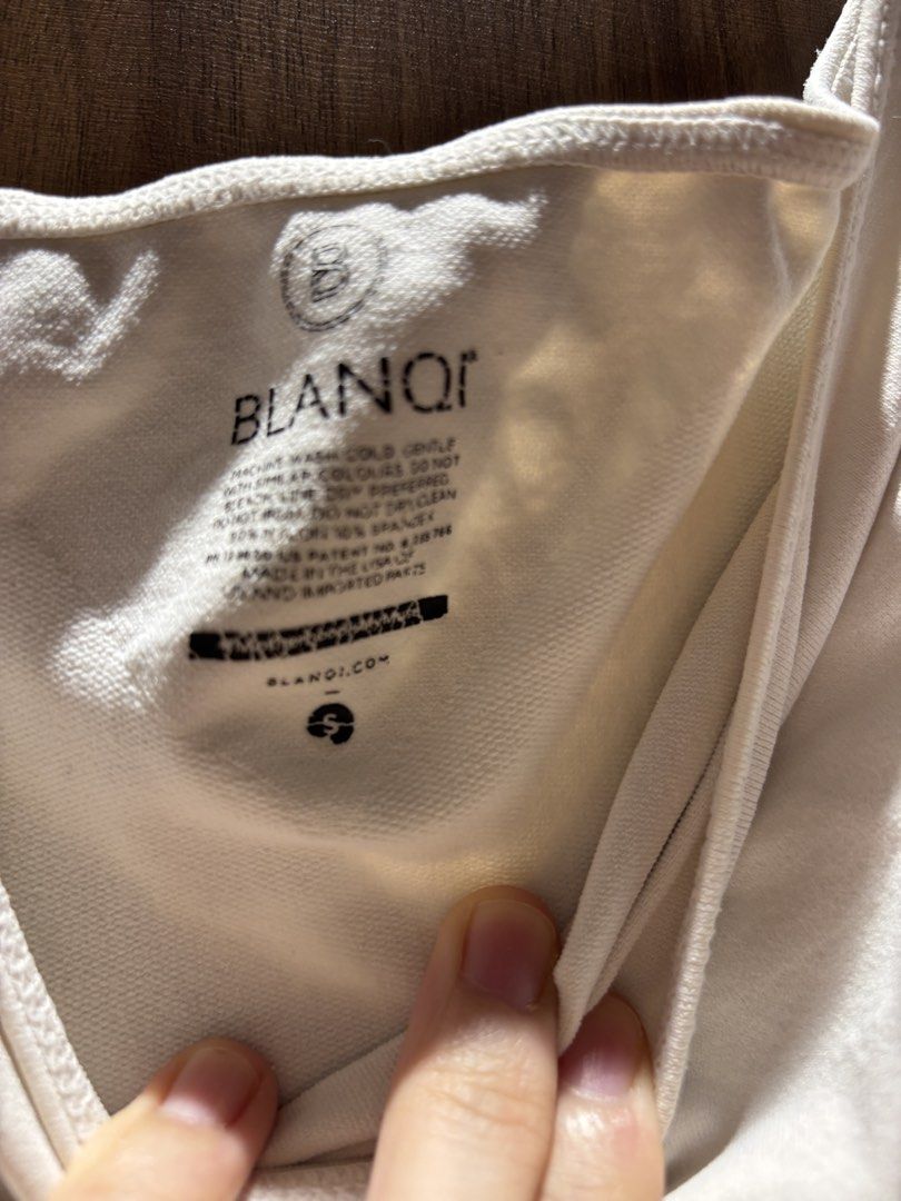BLANQI Maternity Top Size S (Category: Sleeveless) located in Quezon City. Submitted by bingbnb (Listing ID 1462311766, Image 2). Description: - Brand: BLANQI - Color: nude - Style: Tank Top - Neckline: Scoop Neck - Detail: Ribbed texture at hem - Material: Comfortable and stretchy - Versatility: Great for layering or wearing on its own - Size: S.
