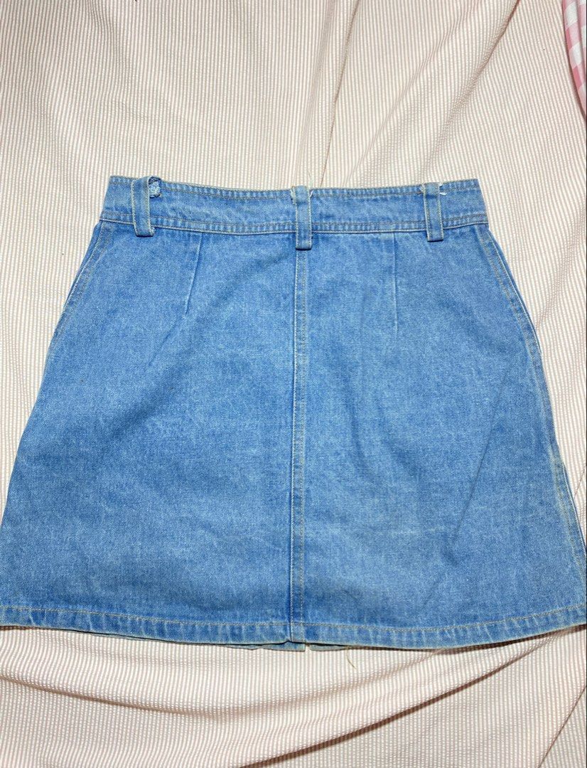 Blue Denim Button-Front A-Line Skirt (Category: Skirts) located in Paranaque City. Submitted by golden_jinkay (Listing ID 1462423668, Image 2). Description: -Waist:28-29 -Lenght 16 - Cute blue denim skirt - Button front closure - Two front pockets - A-line silhouette - Ideal for casual wear - Versatile for pairing with various tops - Pairs well with sneakers or sandals.