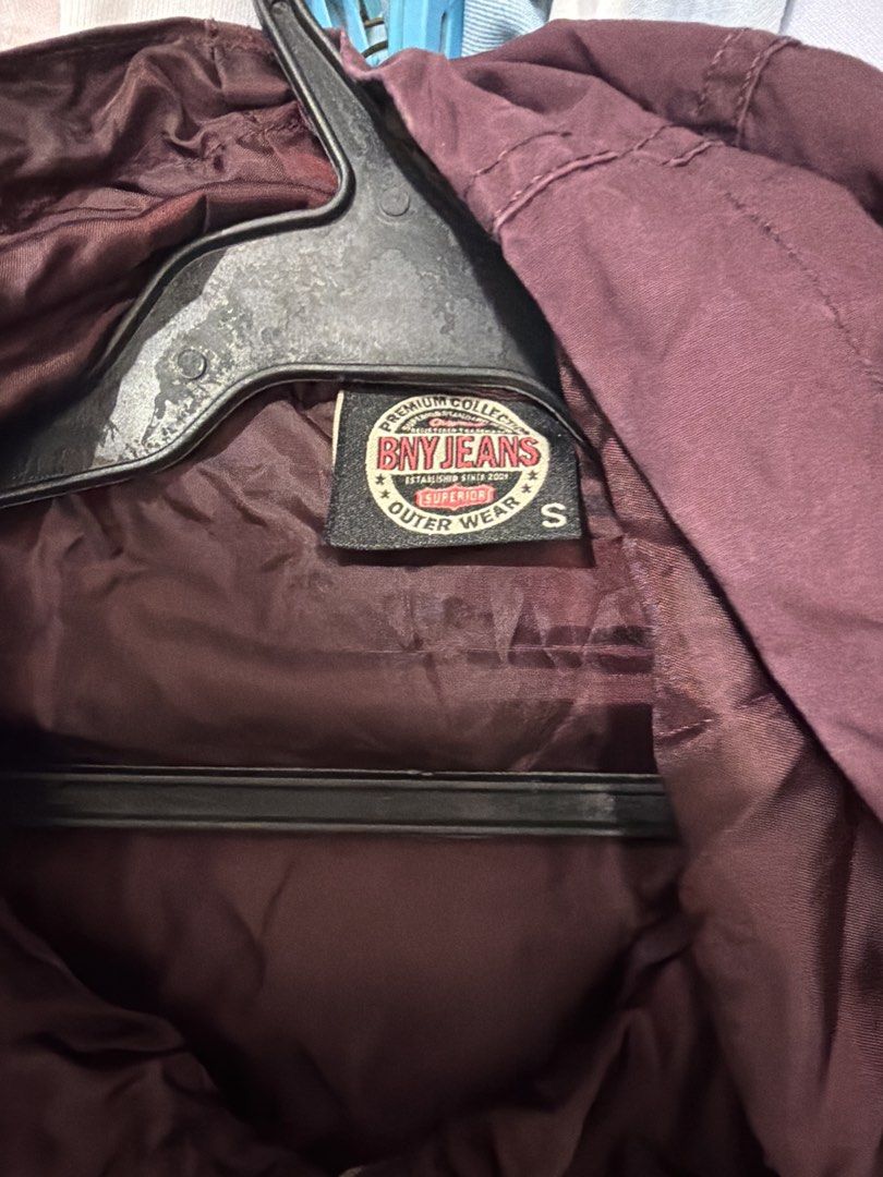 Bny Jeans Premium Collection Outer Wear Jacket Size S (Category: Coats, Jackets and Outerwear) located in Lucena. Submitted by mademoisellemd (Listing ID 1462330176, Image 2). Description: - Burgundy Bny Jeans jacket - Premium collection outerwear - Hood with drawstring waist - Zip and button closure - Two front zip pockets - Size: S - Ideal for layering.
