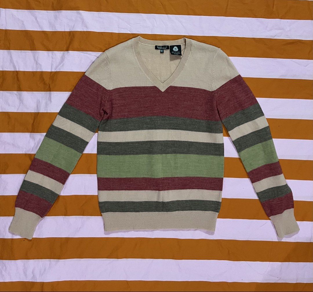 Bossini Y2K Striped Wool Sweater (Category: Coats, Jackets and Outerwear) located in Mandaluyong City. Submitted by hopeworldplane (Listing ID 1462419797, Image 1). Description: - Classic Brooks Brothers v-neck sweater - Features horizontal stripes in cream, burgundy, olive green, and grey - Made from a comfortable wool blend - Versatile for layering or wearing solo - Stylish and comfortable addition to your wardrobe.