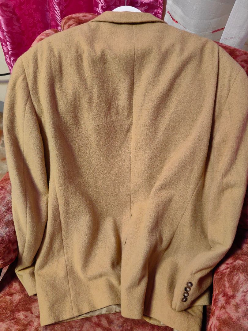 Botany Five Hundred 100% Camel's Hair Blazer (Category: Coats, Jackets and Outerwear) located in Caloocan City. Submitted by jeremiah.curator.2026 (Listing ID 1462262273, Image 2). Description: - Classic camel's hair blazer - Brand: Botany Five Hundred - Origin: Made in Colombia - Material: 100% Camel's Hair - Lining: Smooth satin - Closure: Two-button front - Details: Buttons on cuffs - Style: Perfect for dressing up or down.