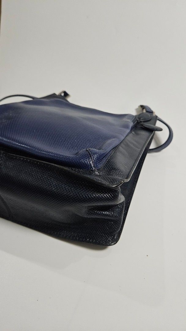 Bottega veneta two tone shoulder Bag (Category: Cross-body Bags) located in Alfonso. Submitted by jbcamet (Listing ID 1462387469, Image 3). Description: - authentic & guranteed - Textured main body for a sophisticated look - Convenient front pouch for quick access - Adjustable strap with sleek silver hardware - Secure zipper closure for the main compartment - Interior lining with a subtle, attractive pattern - Ideal for everyday use and errands.