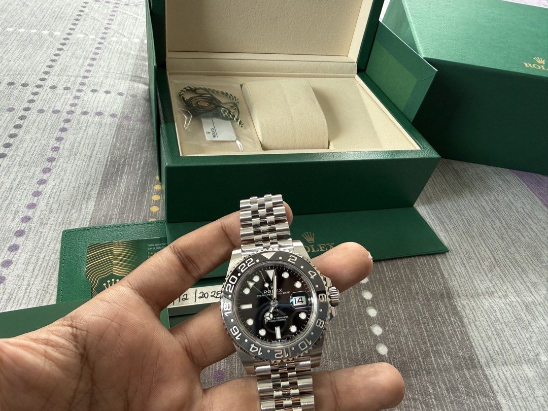 Brand New Rolex Jubilee Gmt Master II 126710GRNR Bruce Wayne (Category: Watches) located in Singapore. Submitted by swisstime.sg (Listing ID 1462284087, Image 2). Description: Brand New Rolex Jubilee Gmt Master II 126710GRNR Bruce Wayne ** Brand New ** Model : 126710GRNR Also known as : Oyster Gmt Master II “Bruce Wayne” Case size : 40mm Dial : Black Dial With Luminous Dot Numerals Index Case metal : Stainless Steel Clasp/ Buckle Type : Steel Fol