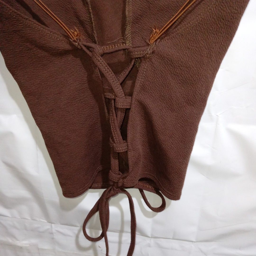 Brown Corset Top with Chain Detail (Category: Others Tops) located in Manila. Submitted by cian.collectives (Listing ID 1462380385, Image 3). Description: ✨ Title: Brown Corset Top with Chain Detail Description: Great and thick fabric, fit to XS-S, with padding and can make ribbon in the back. Comfy to wear. Price: 80.00 Flaws: none Payment Methods: Gcash, Maya (Payment First - No COD) 📍 Note: PLEASE MANAGE YOUR EXPECTATIONS, PRELOVED ITEMS, NO 