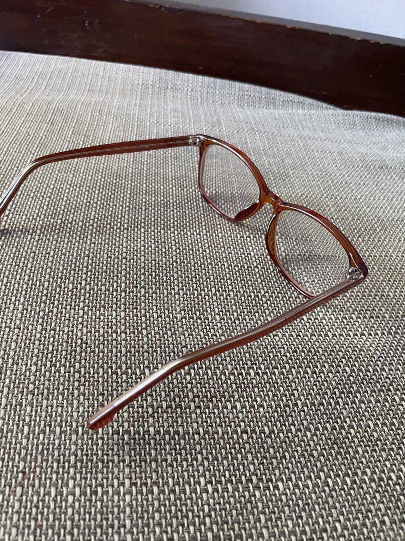 Brown Eyeglasses Frame (Category: Sunglasses & Eyewear) located in Pasig City. Submitted by khaleisi (Listing ID 1462265554, Image 2). Description: - Classic cat-eye shape - Brown color - Thin metallic arms - Ready for prescription lenses - Ideal for everyday wear - With graded lenses .