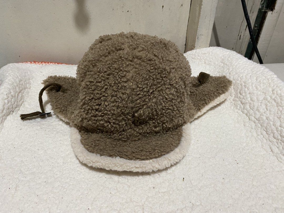 Brown Fuzzy Trapper Hat with Ear Flaps (Category: Caps & Hats) located in Manila. Submitted by resi.diaz (Listing ID 1462345067, Image 1). Description: - Super warm and fuzzy trapper hat - Classic brown color with stylish white trim - Ear flaps can be tied up for versatility - Ideal for keeping warm in cold weather - One size fits most - Soft material for ultimate comfort, inside and out.