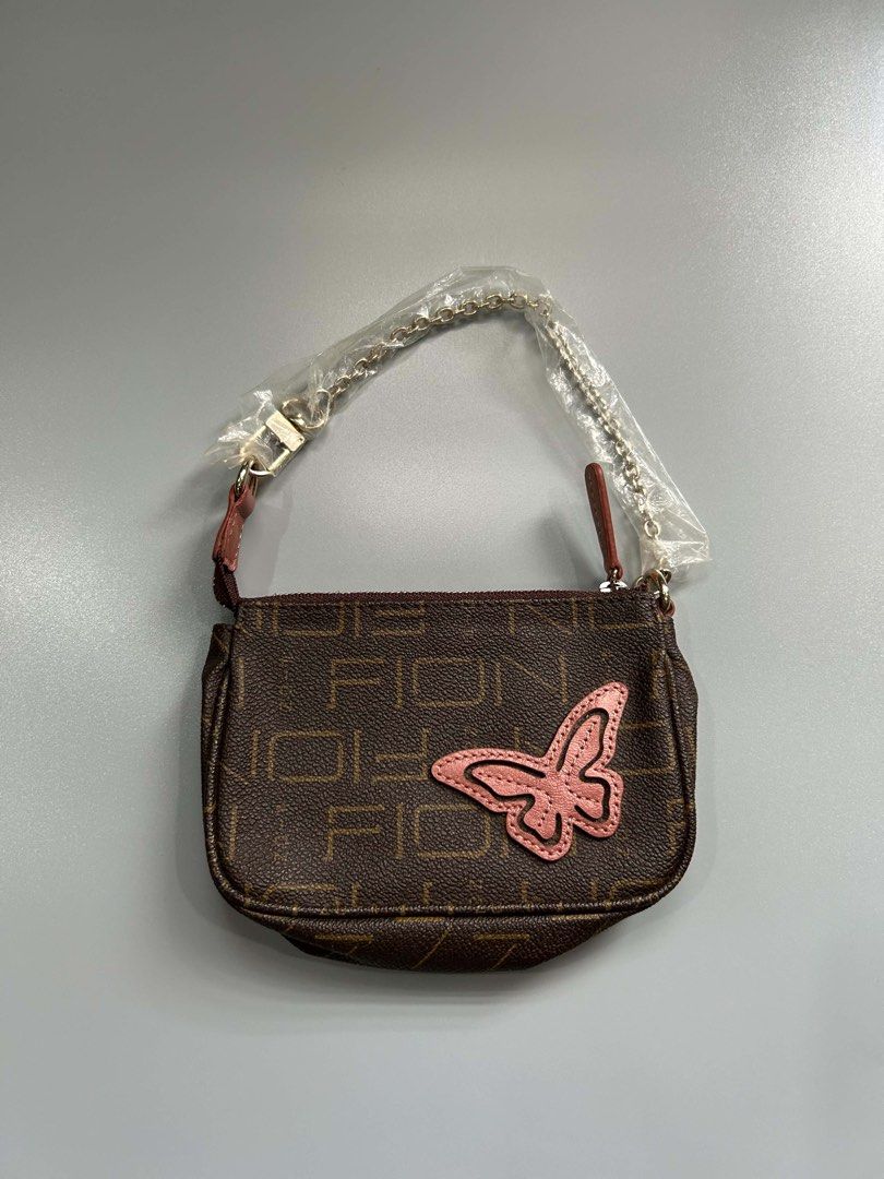 Brown Monogram Butterfly Shoulder Bag (Category: Luxury Bags & Wallets) located in Manila. Submitted by heycessygirl (Listing ID 1462394156, Image 1). Description: - Cute brown shoulder bag - Monogram pattern - Pink butterfly applique on front - Gold chain strap (plastic wrap still on) - Small and compact, ideal for essentials - Zipper closure.