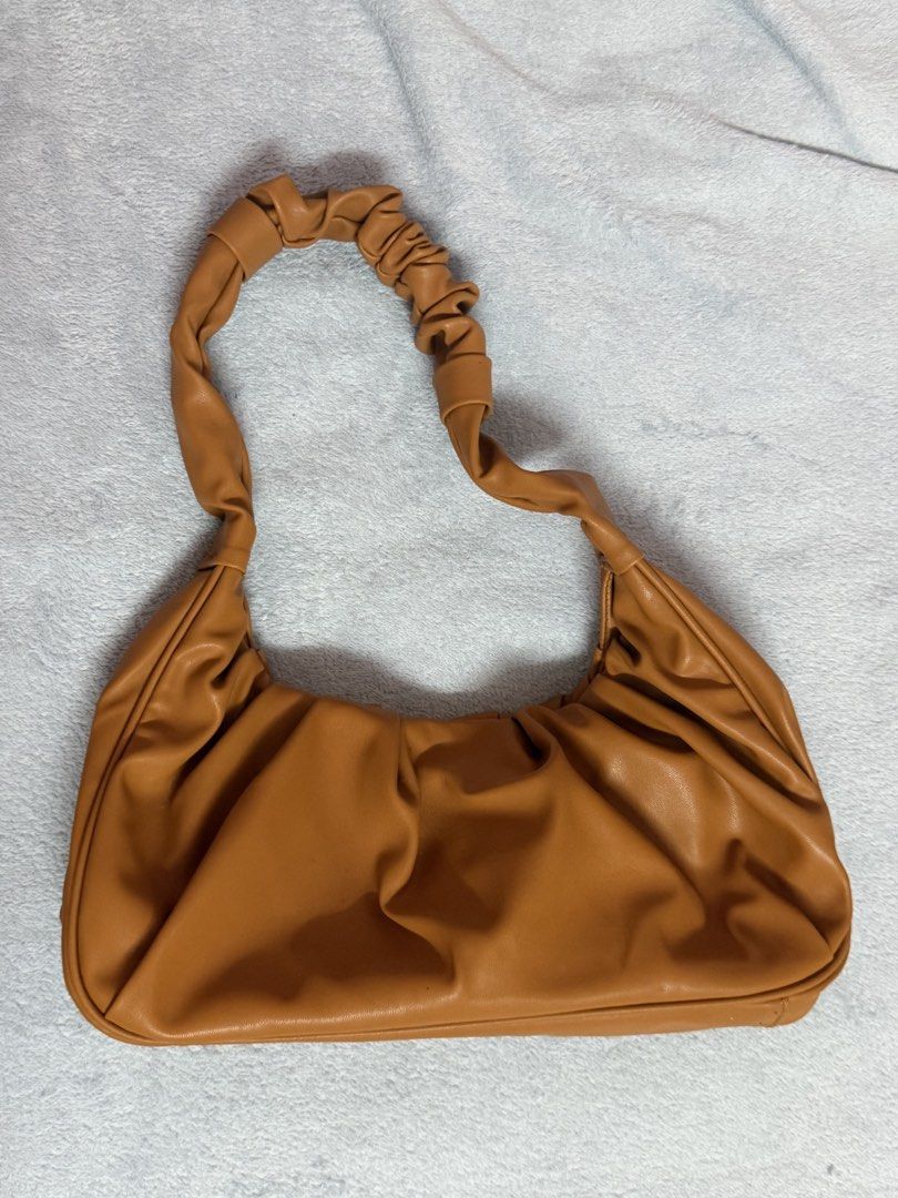 Brown Ruched Shoulder Bag (Category: Shoulder Bags) located in Antipolo. Submitted by hiekeyana (Listing ID 1462402632, Image 1). Description: Got this bag in TJ Max RFS: Decluttering Price is negotiable .