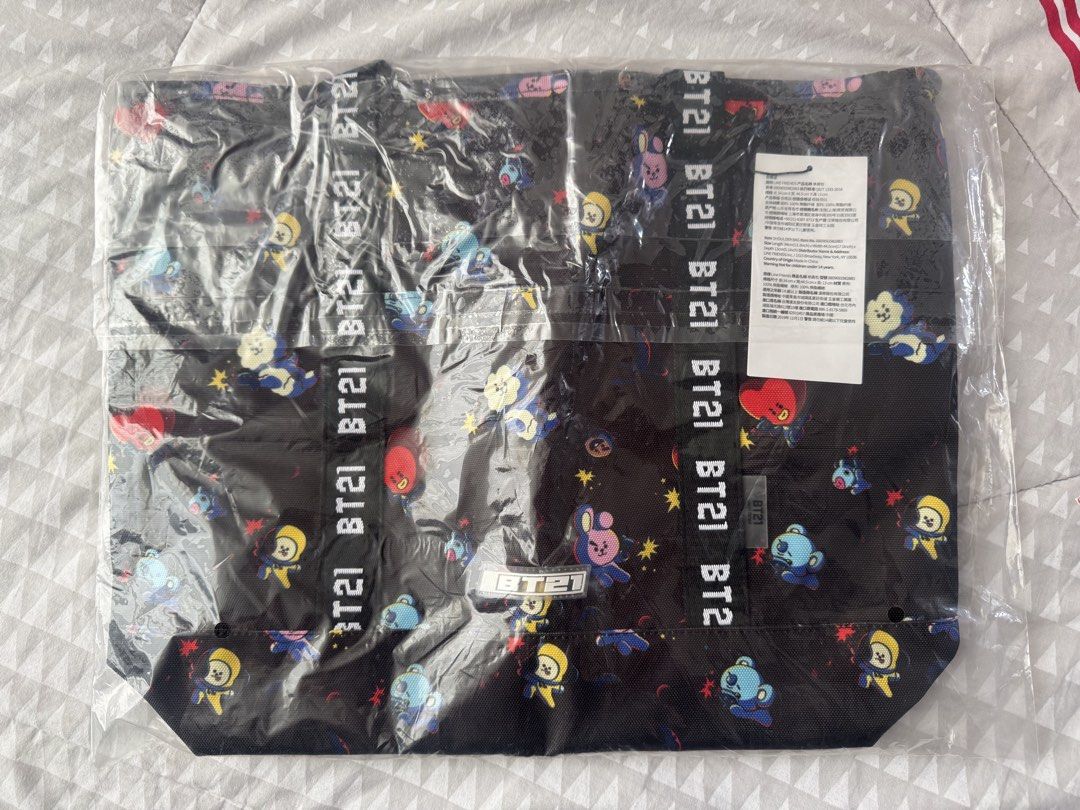BT21 Space Squad Shoulder Tote Bag (Category: Tote Bags) located in San Juan City. Submitted by namhani (Listing ID 1462270773, Image 2). Description: Tote Bag featuring a playful all-over print of colorful animated characters floating against a dark background. .