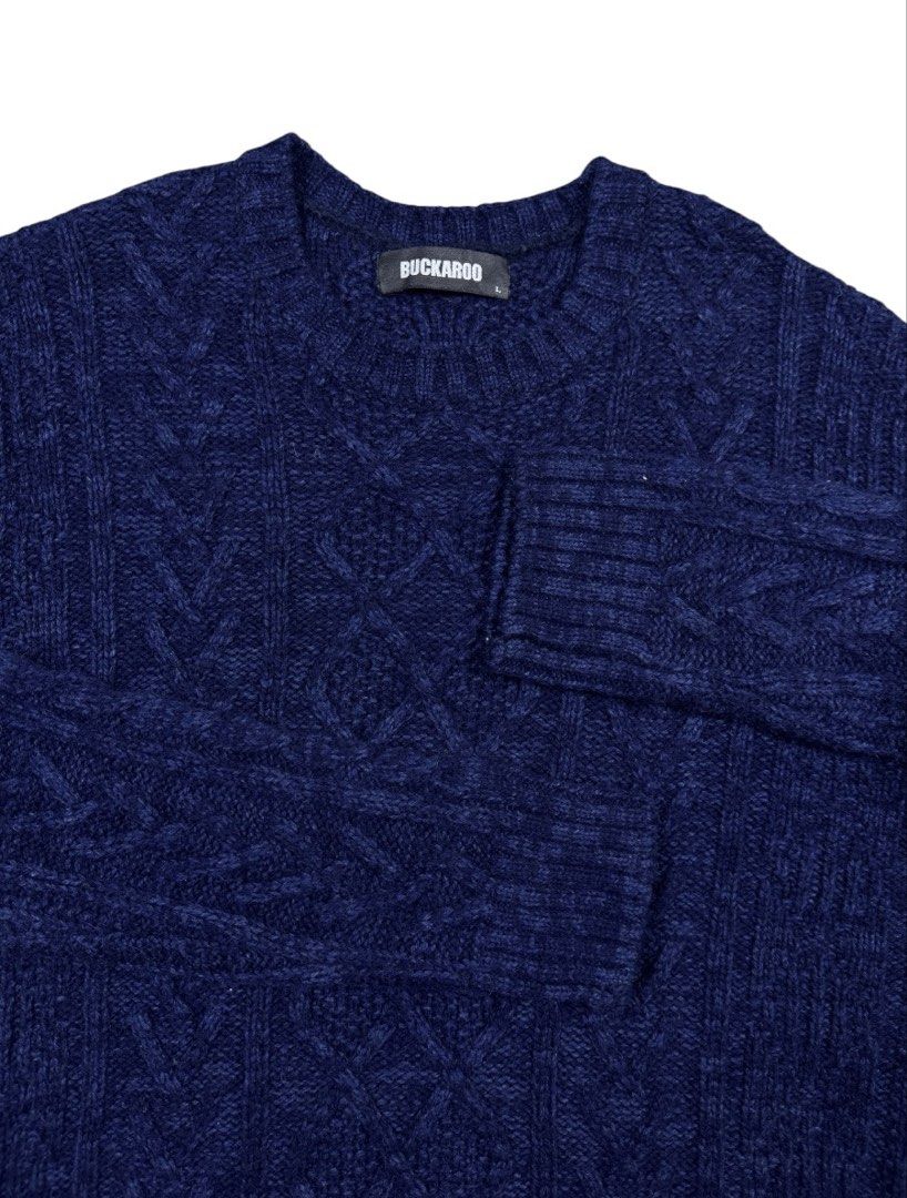 BUCKAROO Navy Blue Cable Knit Sweater (Category: Activewear) located in Zamboanga. Submitted by nurhosinna77344 (Listing ID 1462320907, Image 2). Description: - Brand: BUCKAROO - Color: Navy Blue - Style: Classic Cable Knit - Material: 50% Cotton, 27% Polyester, 23% Acrylic - Size: L - Features: Ribbed cuffs and hem - Origin: Made in Bangladesh.