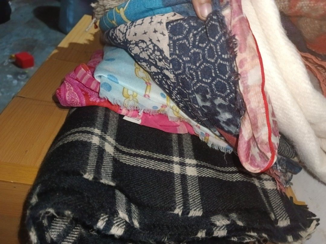 Bundle of assorted scarves, various patterns and colors (Category: Scarves) located in Valenzuela. Submitted by relchris22 (Listing ID 1462273826, Image 3). Description: - Bundle of assorted scarves: includes patterned, plaid, and solid colors. - Versatile styles: lightweight to thicker options suitable for different seasons. - Fashionable accessory: perfect for adding a pop of color to any outfit..