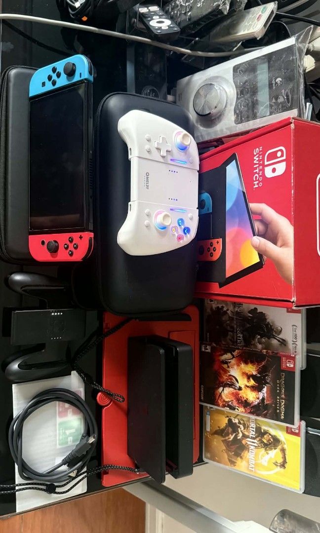 Bundle sale nintedo switch OLED (Category: Nintendo) located in Manila. Submitted by armani04 (Listing ID 1462304092, Image 1). Description: Nintendo switch OLED/Bundle 4games 2case 1 wireless controller complete/old box 1 tempered glass loc. near Cambridge village eastbank road floodway cainta rizal/Pwede meet up Basta malapit lang unli check po.