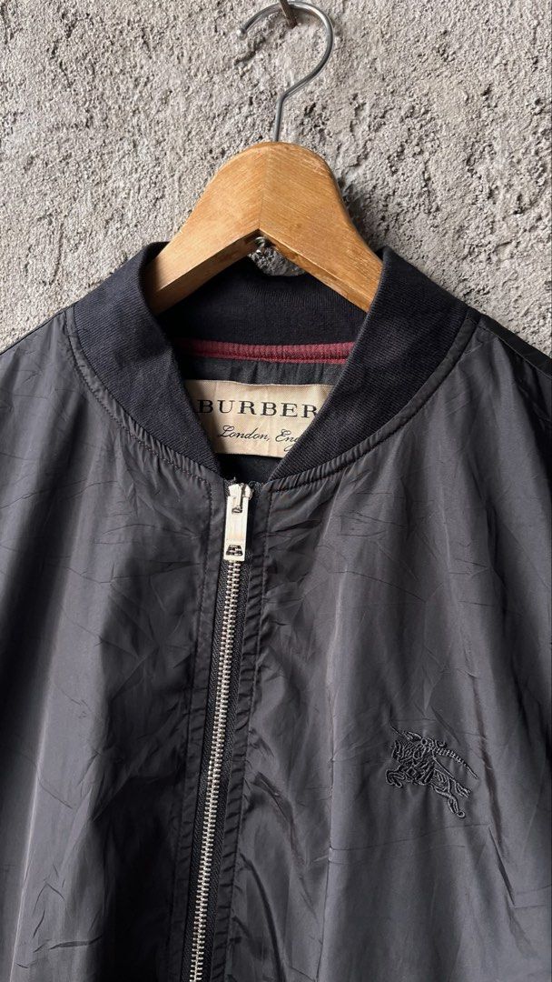 Burberry black bomber jacket (Category: Luxury Apparel) located in Cabuyao City. Submitted by kisyana (Listing ID 1462355681, Image 2). Description: .