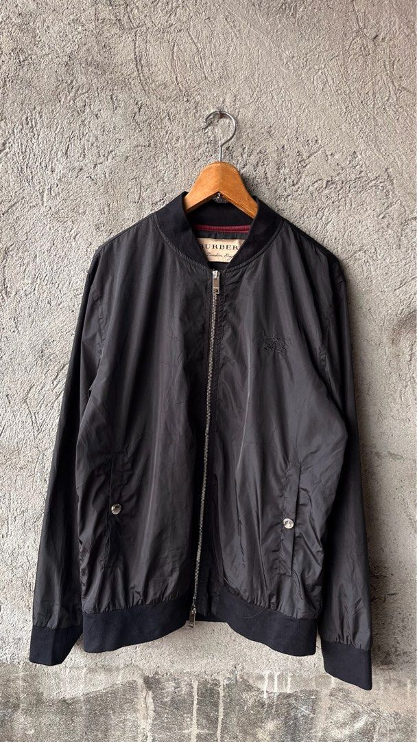 Burberry black bomber jacket (Category: Luxury Apparel) located in Cabuyao City. Submitted by kisyana (Listing ID 1462355681, Image 1). Description: .