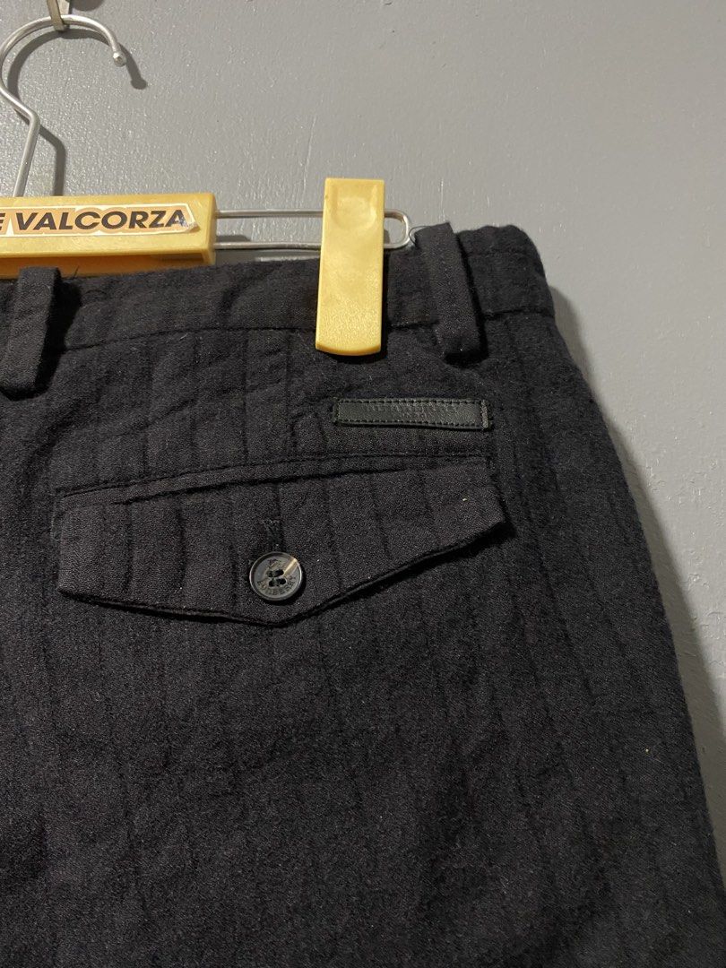 Burberry Black Pinstripe Tailored Shorts (Category: Shorts) located in Tanay. Submitted by judevalcorza (Listing ID 1462408488, Image 3). Description: - Black tailored shorts with subtle pinstripe texture. - Burberry Short size 32 length 17 - Secure button and zip front closure. - Two functional back pockets with button details. - Inner lining features the classic Burberry check pattern. - Ideal for achieving a stylish smart casual look. - excell