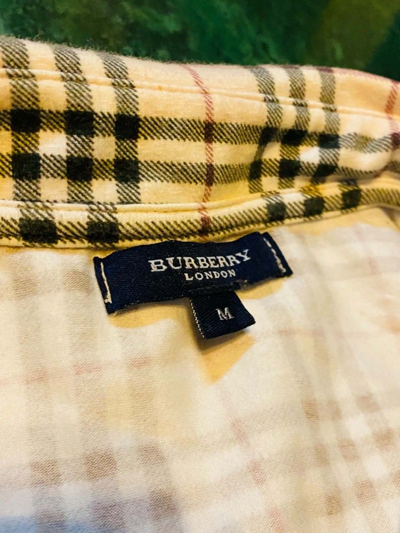 Burberry Grey Cotton Nova Check Collared Short Sleeve Polo (Category: Shirts) located in San Isidro, Davao Oriental. Submitted by ranofrehets (Listing ID 1462421044, Image 3). Description: Burberry Grey Cotton Nova Check Collared Short Sleeve Polo P470 plus sf No Issues No Stain Goods pa Medium to Large frame.
