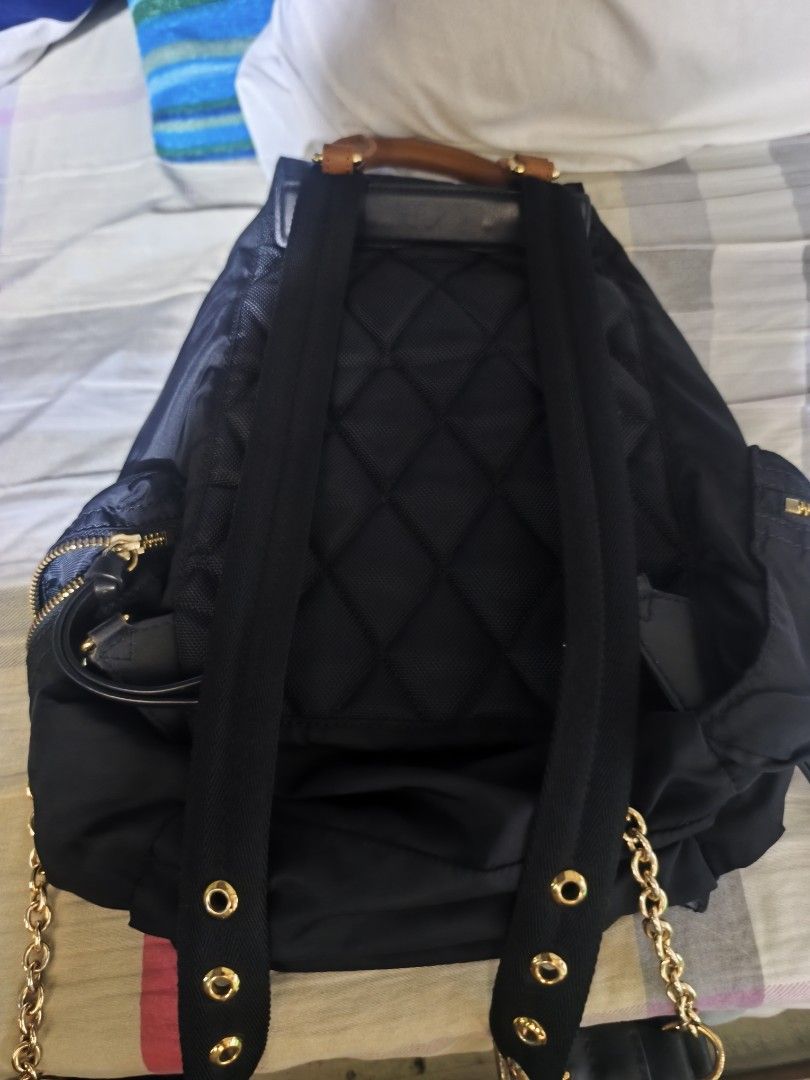 BURBERRY Nylon Leather Backpack Rucksack Gold Chain (Category: Luxury Bags & Wallets) located in Manila. Submitted by rms.thrift (Listing ID 1462439786, Image 3). Description: aunthetic like new no issue.