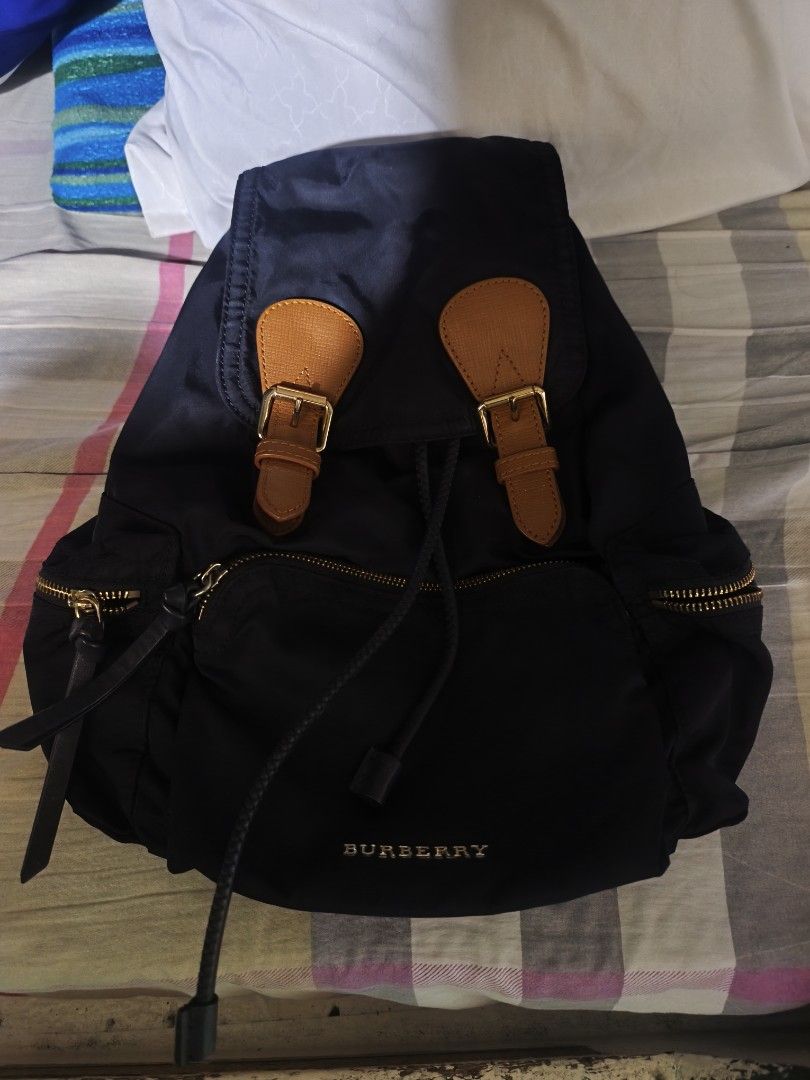 BURBERRY Nylon Leather Backpack Rucksack Gold Chain (Category: Luxury Bags & Wallets) located in Manila. Submitted by rms.thrift (Listing ID 1462439786, Image 1). Description: aunthetic like new no issue.