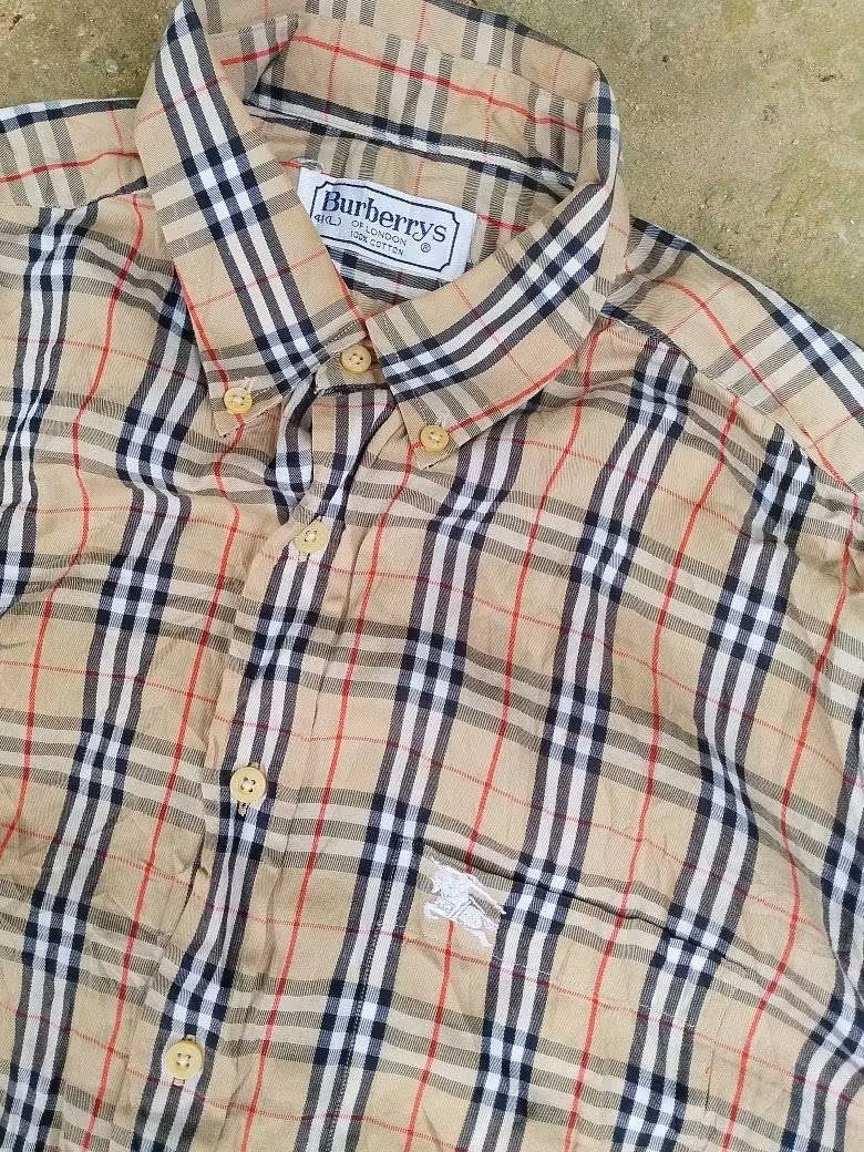 Burberry Vintage Plaid Polo (Category: Activewear) located in Manila. Submitted by thrift_marvs (Listing ID 1462424956, Image 3). Description: Burberry Vintage Plaid Polo Excellent Condition Dimension 24/30 No Issue Authentic 2499 free shipping.
