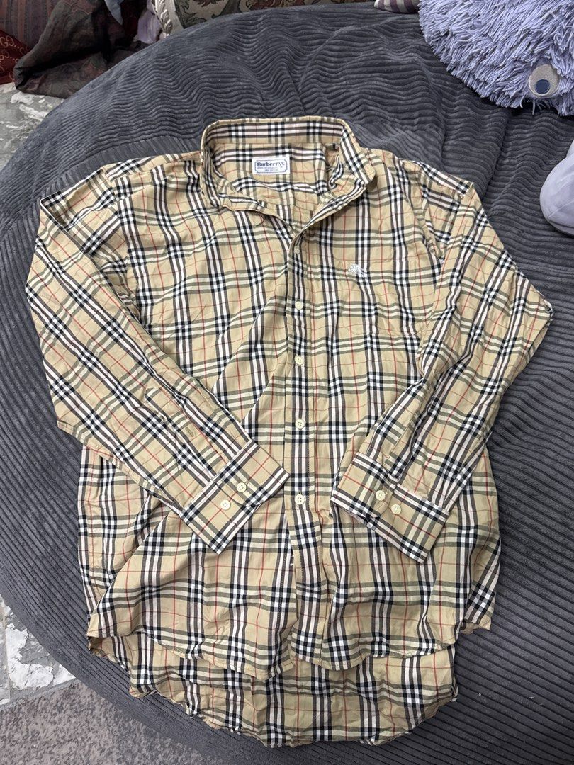 Burberrys Nova Check Long Sleeve Shirt (Category: Tshirts & Polo Shirts ) located in Angeles City. Submitted by migs_font29 (Listing ID 1462395314, Image 1). Description: - Classic Burberrys Nova Check Long Sleeve Shirt - Iconic all-over check pattern - Chest pocket with embroidered knight logo - Made of 100% cotton - Button-up front and cuffs - Versatile addition to any wardrobe.