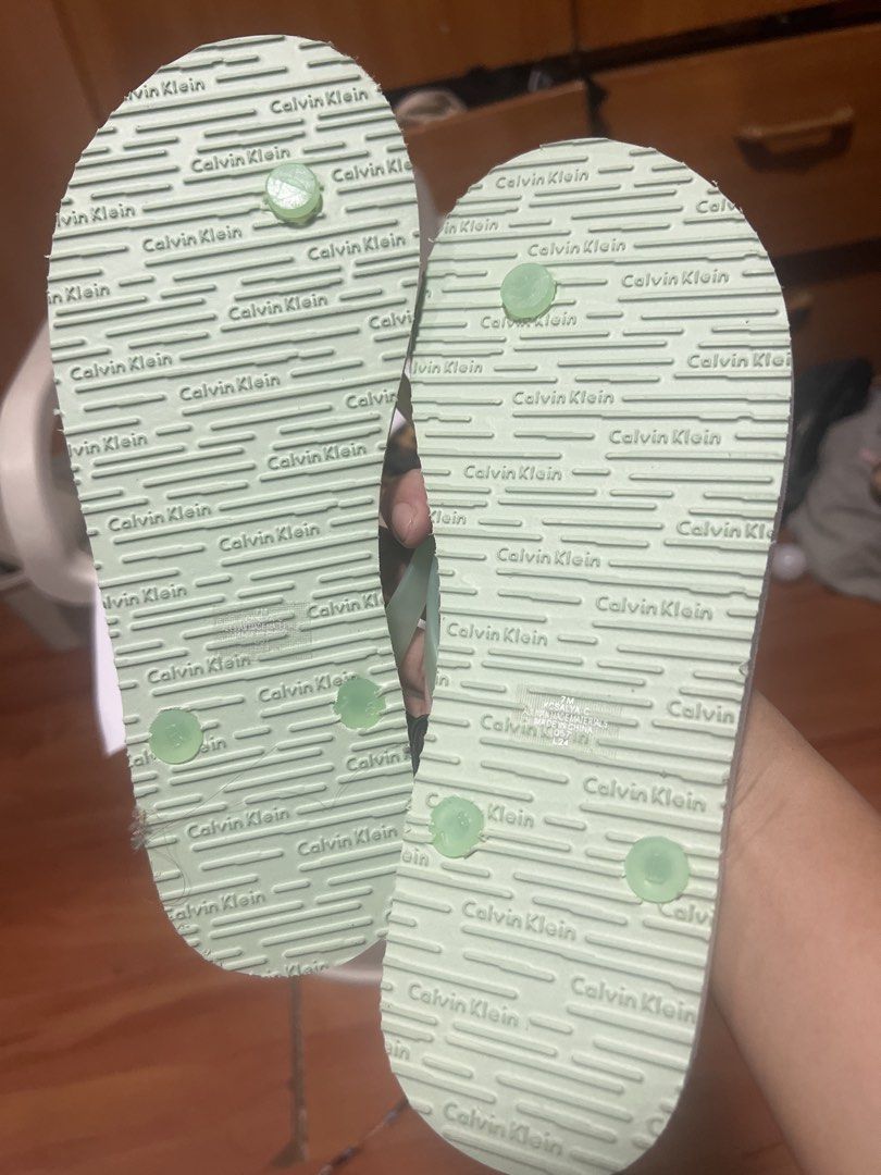 Calvin Klein Light Green Flip Flops Size 7 (Category: Slippers and slides) located in Pasig City. Submitted by zebteashoppe01 (Listing ID 1462359732, Image 1). Description: - Light green Calvin Klein flip flops - Size 7 - Large Calvin Klein logo on top - Repeating Calvin Klein logo pattern on soles - Ideal for beach or pool Original from US brand new 09096535540 Same number gcash mode of payment Jnt Pasig .