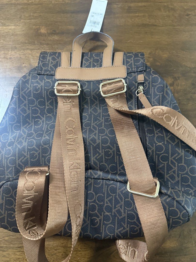 Calvin Klein Teodora Backpack Brown Monogram (Category: Backpacks) located in Taguig. Submitted by seller198 (Listing ID 1462417709, Image 2). Description: Original tag still attached..