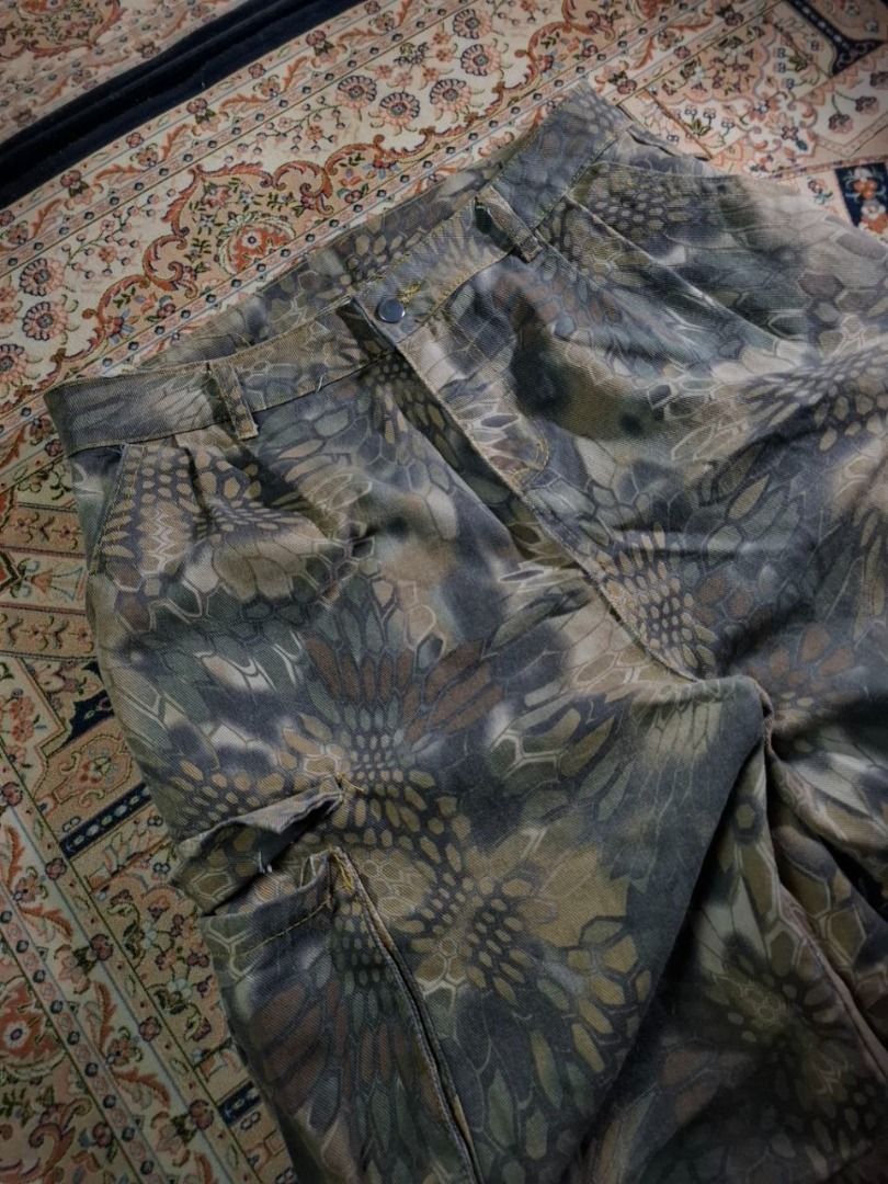 Camouflage Cargo Pants with Multiple Pockets (Category: Jeans) located in Cagayan de Oro. Submitted by prudentials.ph (Listing ID 1462265596, Image 3). Description: CAMOUFLAGE BAGGY CARHO JEANS Size: 34 lenght: 43 thigh: 14 leg opening: 12 (M) mine 500+SF model's height: 5'7 model's size: 30 DM @prudentials.ph on Instagram for more inquiries!.