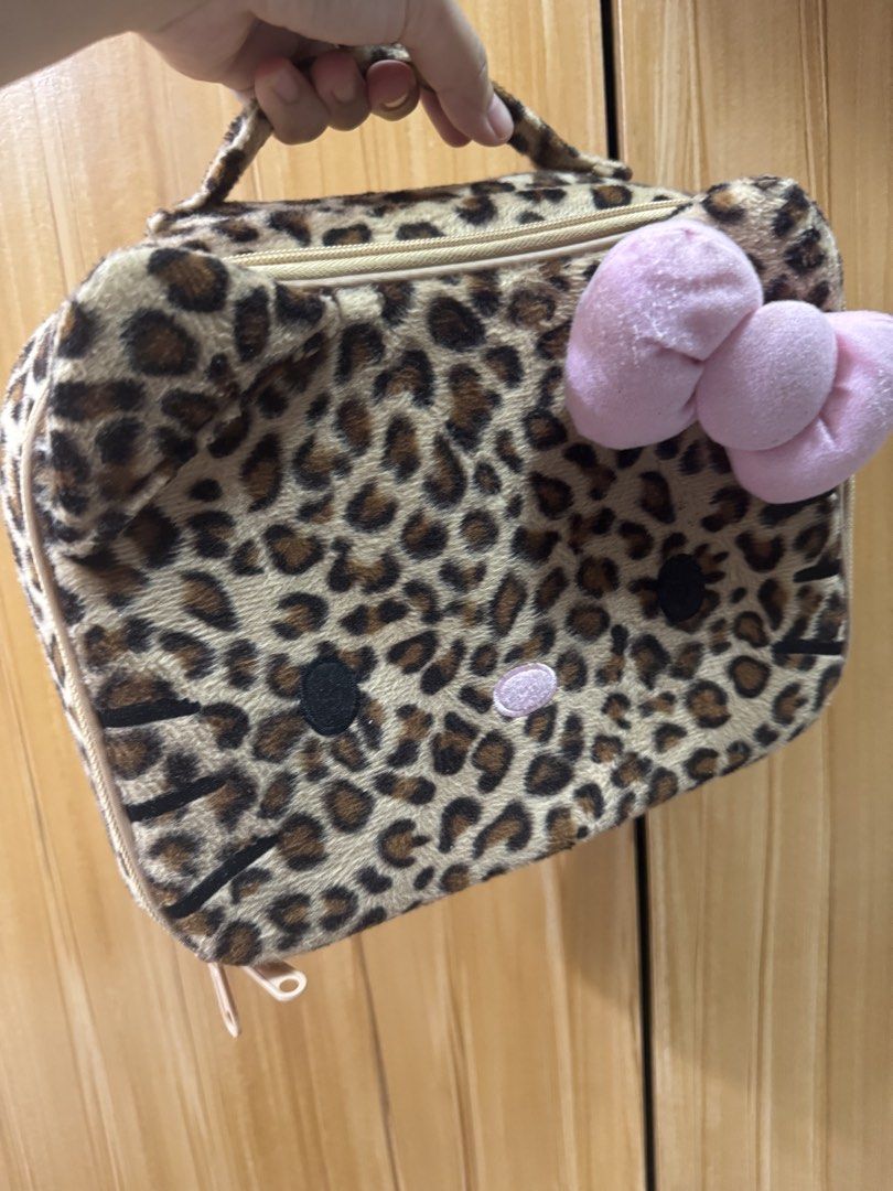 Hello Kitty Leopard Print Cosmetic Bag (Category: Purses & Pouches) located in Manila. Submitted by prelovedshop0818 (Listing ID 1462405025, Image 3). Description: .