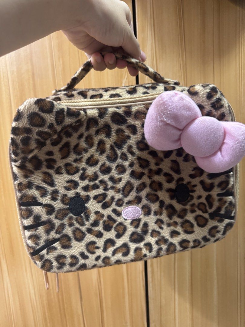 Hello Kitty Leopard Print Cosmetic Bag (Category: Purses & Pouches) located in Manila. Submitted by prelovedshop0818 (Listing ID 1462405025, Image 2). Description: .