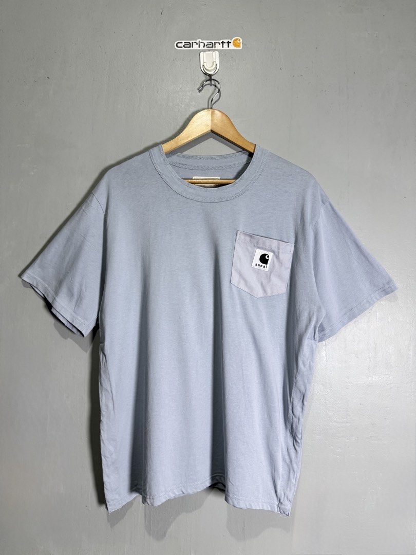 Carhartt x Sacai (Category: Tshirts & Polo Shirts ) located in Sipalay. Submitted by collidethrift (Listing ID 1462396815, Image 1). Description: Carhartt x Sacai Pocket Tee (Light Blue) Size Small fit Medium to Large Dimes 28 x 23 Good as new 1300 shipped.