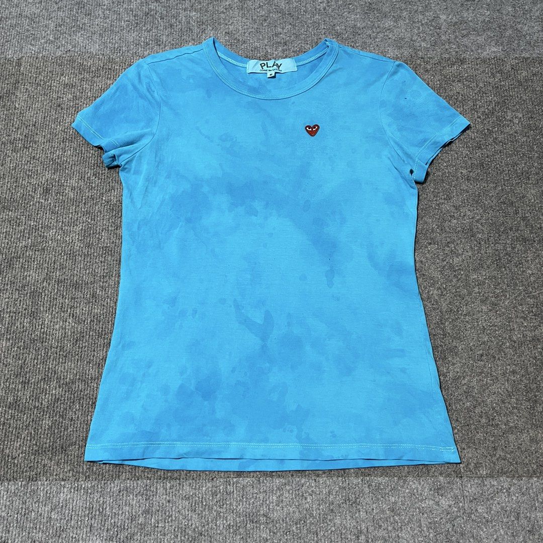 cdg play top shirt (Category: Shirts) located in Malay. Submitted by oplt_dept. (Listing ID 1462359686, Image 1). Description: -washed & clean (ready to wear) -luxury essentials -size:small-medium -width:18 -length:24 -exellent condition .