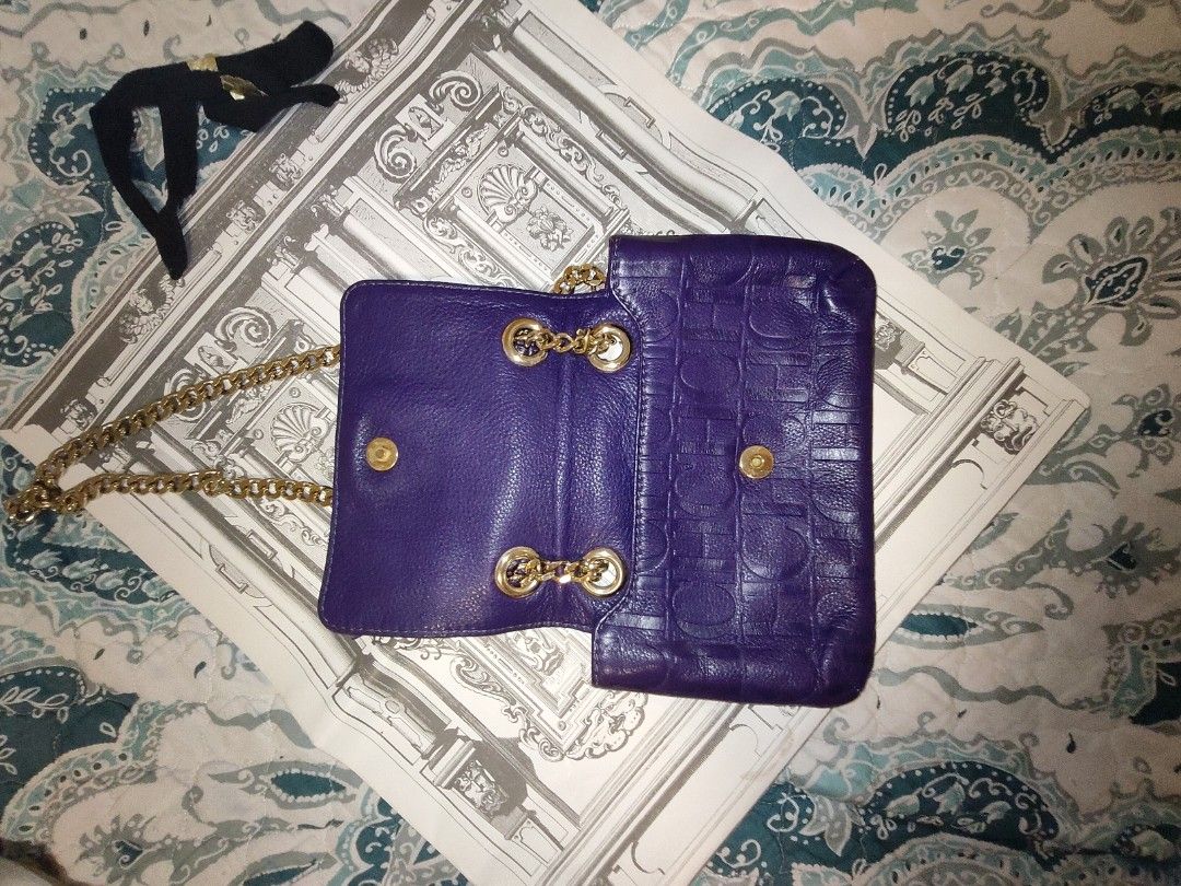 CH Carolina Herrera Audrey Monogram Embossed Leather Bag (Category: Shoulder Bags) located in Valenzuela. Submitted by kchinadol (Listing ID 1462302887, Image 3). Description: CH Carolina Herrera Audrey Monogram Embossed Leather Bag Color/Material: Deep purple textured leather with matching prominent front bowStrap/Hardware: Gold-tone polished chain strap and loop Condition Details (Pre-Owned / Fair to Good): Please review all photos carefully as