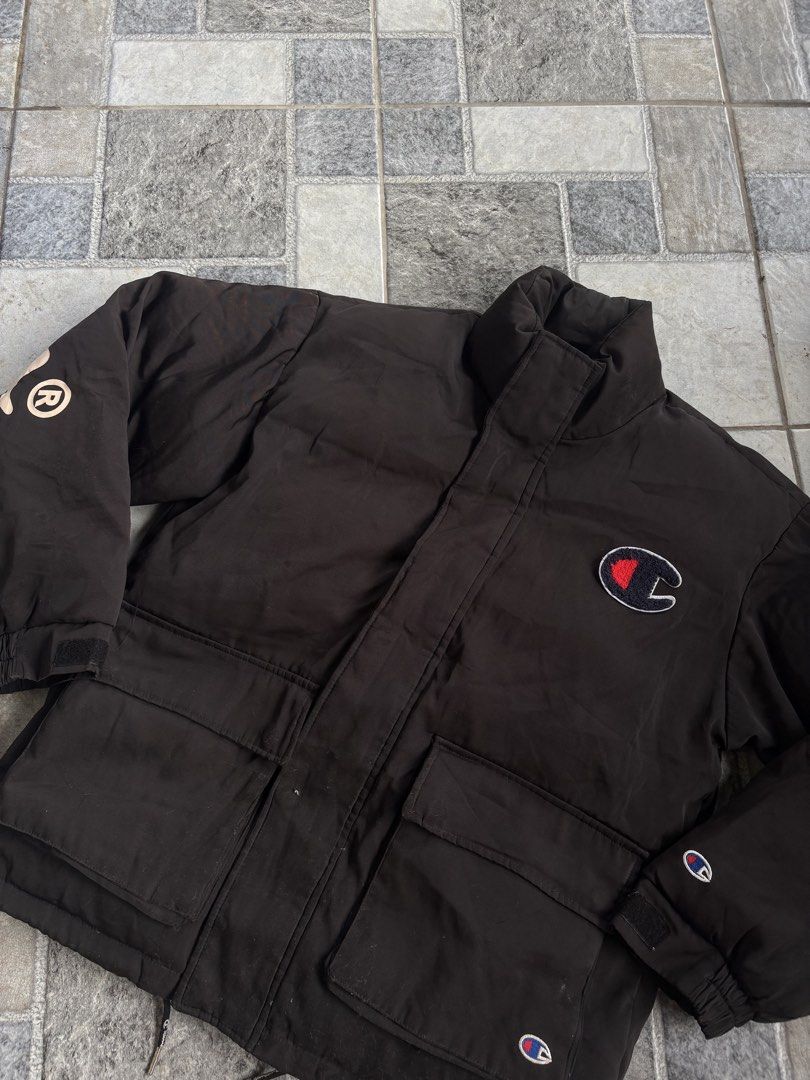 Champion X Supreme Puffer Jacket (Category: Coats, Jackets and Outerwear) located in Calamba. Submitted by manila.fits (Listing ID 1462325886, Image 3). Description: Champion X Supreme Medium Width 23 Length 27 Good Condition Issue swipe pics .