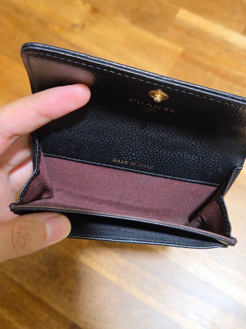 Chanel Black Leather Wallet (Category: Luxury Bags & Wallets) located in Pasig City. Submitted by djddmd (Listing ID 1462392177, Image 3). Description: - black caviar quilted - faded gold CC logo & snap closure is a bit loose but received it this way - bought from The Bag Hub for ₱33K last Sept 5, 2026 and used it once only - with box, dust bag, receipt - holo intact - can send more photos! :) Loc: kapitolyo MOP: BPI/Gcash MOD: grab/lalamove *sf 