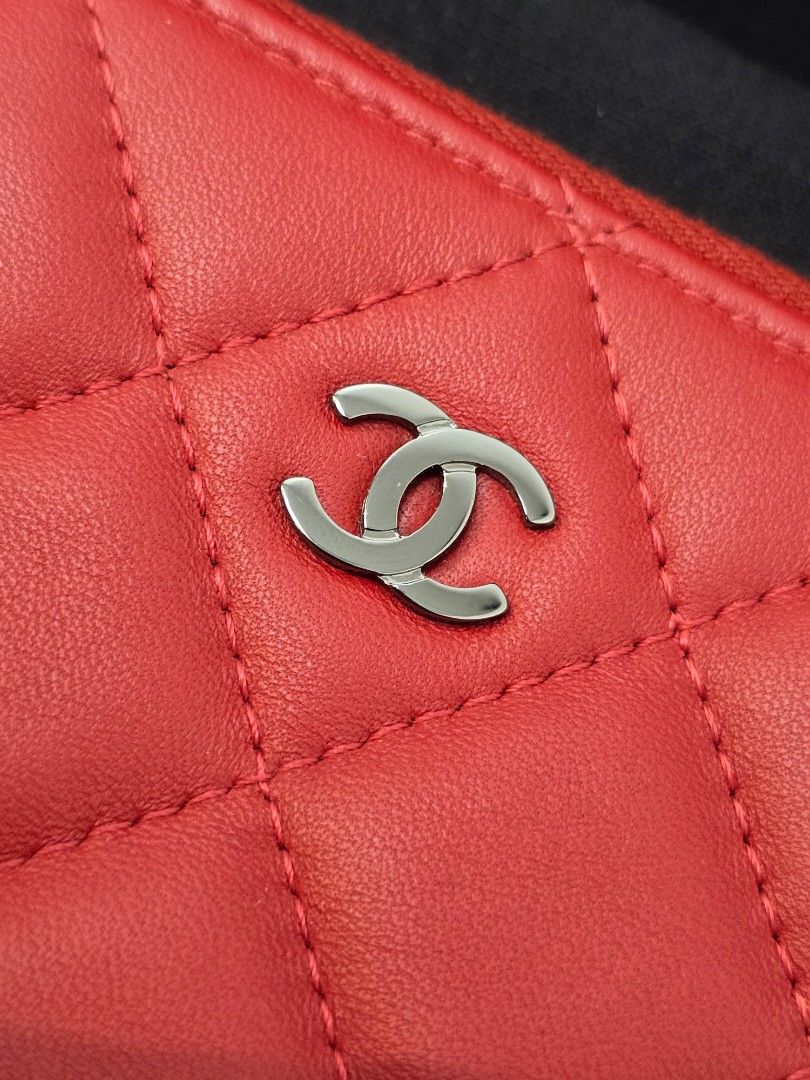 Chanel O-Case Red Quilted Medium Zip Pouch Bag (Category: Luxury Accessories) located in Taguig. Submitted by mluxeph (Listing ID 1462294087, Image 3). Description: Chanel O-Case Red Quilted Medium Zip Pouch Bag Gender: Unisex Material: Lambskin leather Stamp: 20350593 Year: 2014-2015 Interior: One main compartment Measurements: 11”L X 8”H Handle Drop: None Hardware: Gunmetal Inclusions: Original box, original dust bag and authenticity card from 