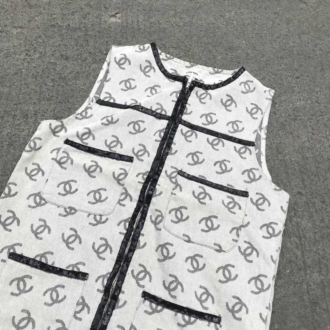 CHANEL-CC LOGO PATTERN SLEEVELESS DENIM VEST (Category: Luxury Apparel) located in Bulacan. Submitted by xxboutique2428 (Listing ID 1462288203, Image 2). Description: CHANEL-CC LOGO PATTERN SLEEVELESS DENIM VEST ✨ Stylish • Classic • Elegant • Versatile ✨ Elevate your everyday look with this stylish sleeveless vest/top featuring an elegant all-over interlocking CC-style pattern and contrasting black details. PRODUCT DETAILS: 🤍 Color: White / Off