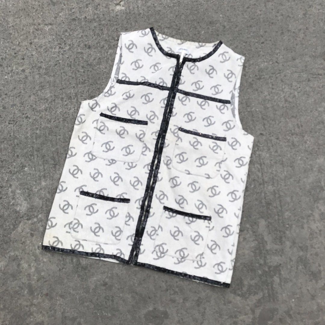 CHANEL-CC LOGO PATTERN SLEEVELESS DENIM VEST (Category: Luxury Apparel) located in Bulacan. Submitted by xxboutique2428 (Listing ID 1462288203, Image 1). Description: CHANEL-CC LOGO PATTERN SLEEVELESS DENIM VEST ✨ Stylish • Classic • Elegant • Versatile ✨ Elevate your everyday look with this stylish sleeveless vest/top featuring an elegant all-over interlocking CC-style pattern and contrasting black details. PRODUCT DETAILS: 🤍 Color: White / Off