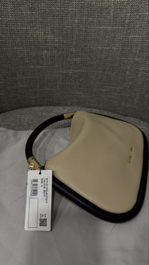 Charles & Keith Beige & Black Handbag (Category: Luxury Bags & Wallets) located in Quezon City. Submitted by geeyaay (Listing ID 1462305610, Image 3). Description: .