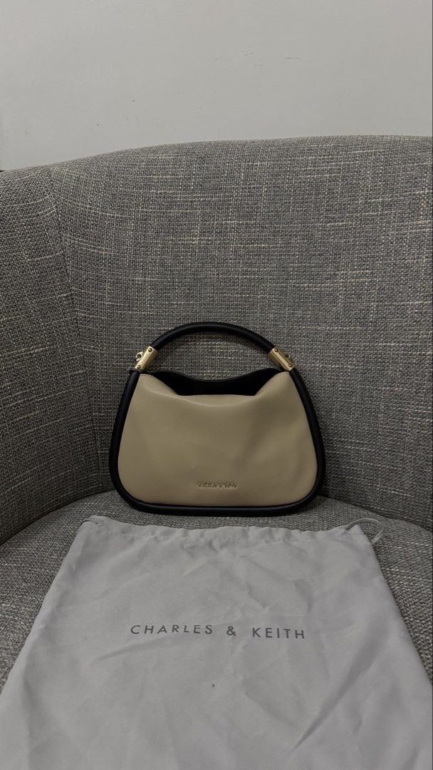 Charles & Keith Beige & Black Handbag (Category: Luxury Bags & Wallets) located in Quezon City. Submitted by geeyaay (Listing ID 1462305610, Image 1). Description: .