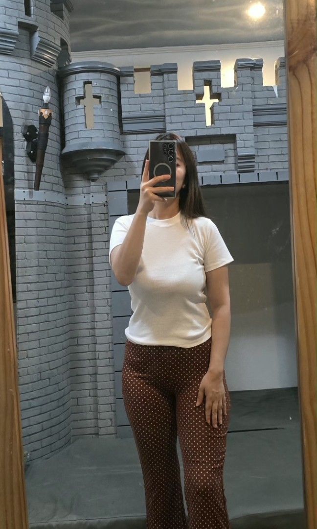 Choco Brown Polka Flare Leggings (Category: Other Bottoms) located in Manila. Submitted by kayencee_27 (Listing ID 1462415927, Image 2). Description: Brand new Polka Leggings With clear plastic Cotton spandex Garterized waist - 26"-32" Length - 42.