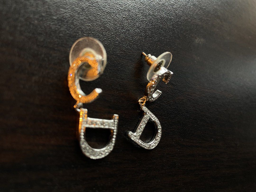 RUSH PRICE 5500! Christian Dior CD Logo Rhinestone Earrings (Category: Earrings) located in Baguio. Submitted by otracosa (Listing ID 1462301110, Image 2). Description: Christian Dior CD Logo Rhinestone Earrings Given by family as a gift, year 2019 Sold as is, no box etc 10500, negotiable if sure buyer For dropping or meet-up if Baguio For shipping, buyer shoulders SF.