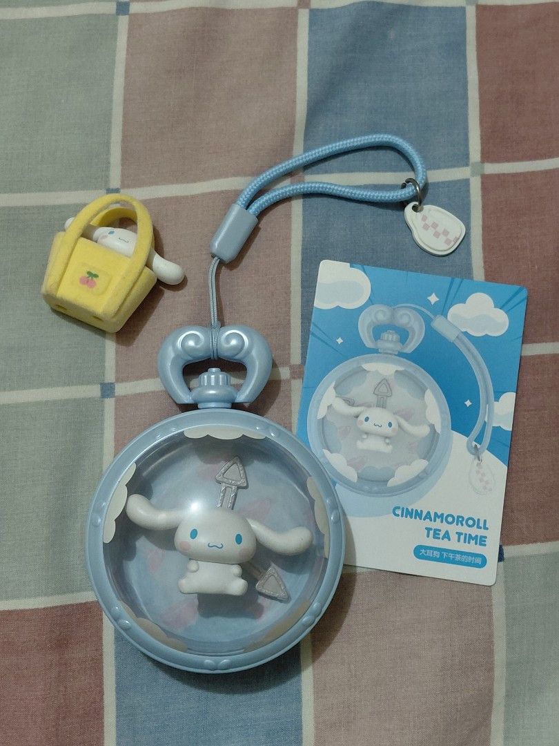 Cinnamoroll Tea Time Keychain Pop Mart Sanrio (Category: Character Goods) located in Manila. Submitted by plath-itudes (Listing ID 1462366468, Image 1). Description: - authentic sanrio cinnamoroll popmart! - free tiny cinnamoroll in yellow velour bag (authentic rin sya 🫶) rfs: need funds + decluttering.